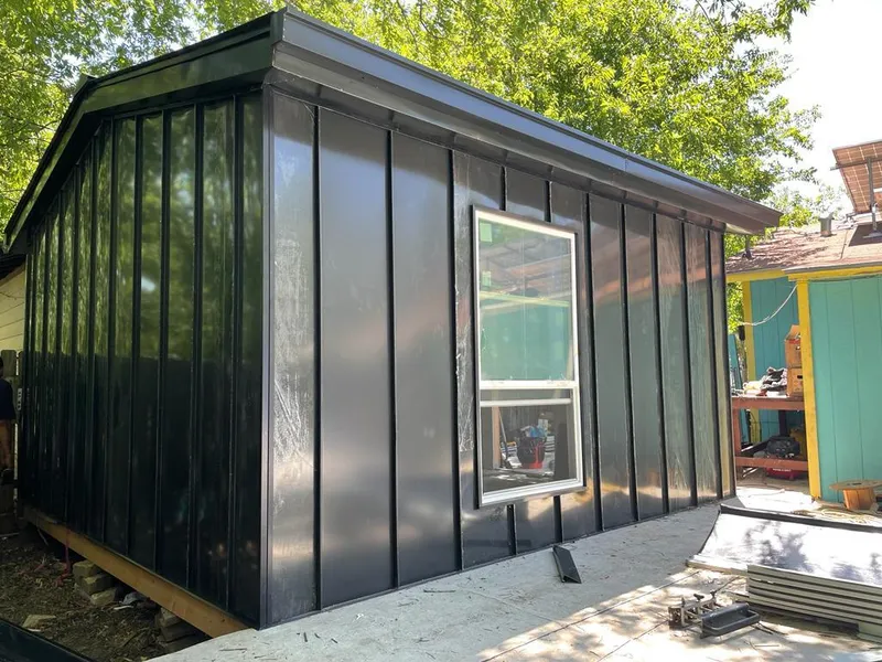 Black standing seam metal wall panels for Roof Inspection in St. Clair Shores