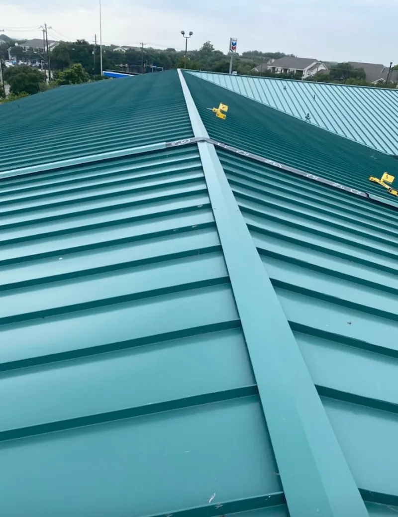 Green commercial metal roof ridge and valley for Metal Roof Repair in St. Clair Shores
