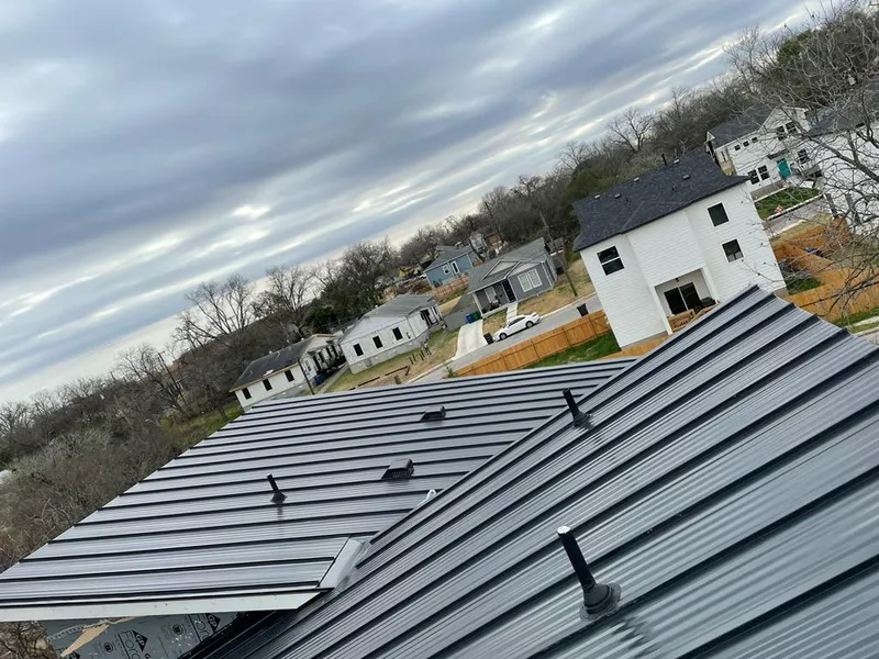 Standing seam metal roof panels with vents for Skylight Repair in St. Clair Shores